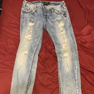 Silver ripped skinny jeans
